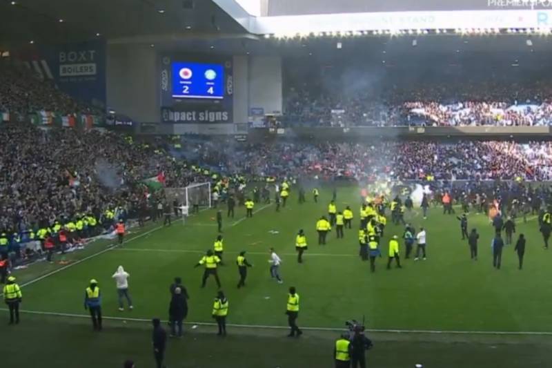Shocking scenes as Rangers vs Celtic ends in pitch invasion chaos as supporters clash