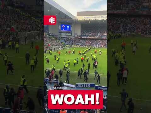 😡 𝐃𝐈𝐒𝐆𝐑𝐀𝐂𝐄𝐅𝐔𝐋 &ndash; Crazy scenes at O** F*** as police separate Celtic & Rangers fans on Ibrox pitch!