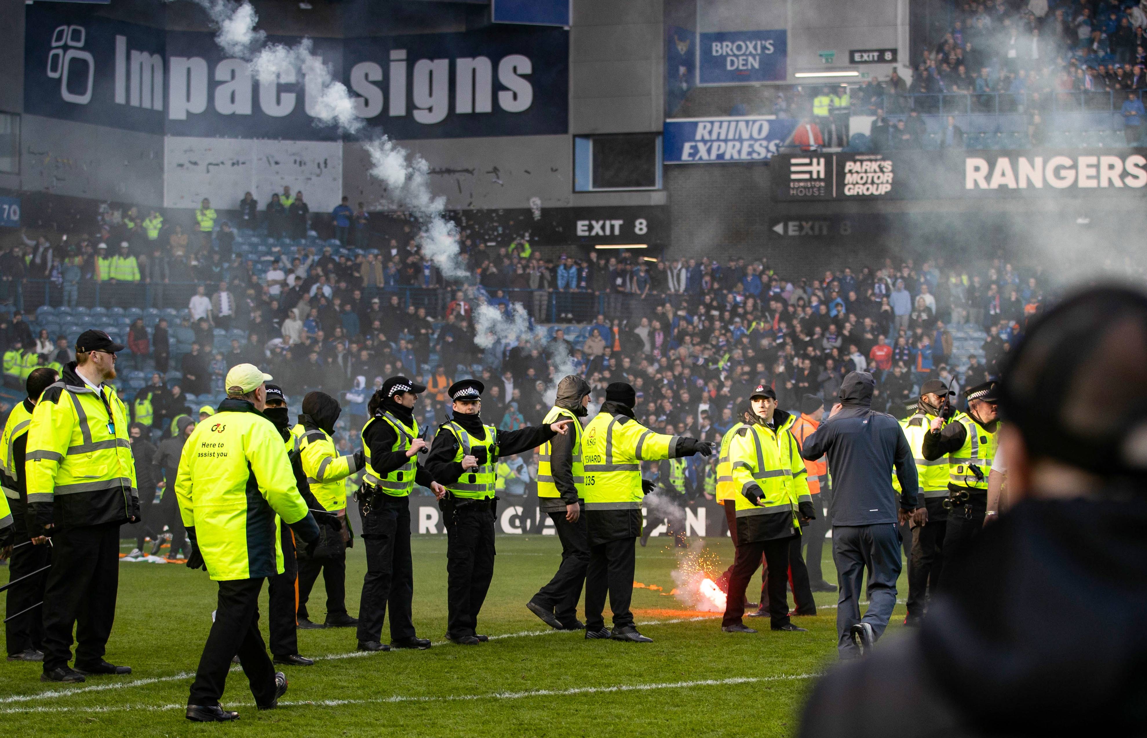 Police Scotland condemn ‘despicable’ Rangers vs Celtic pitch invasion as ‘robust investigation’ launched