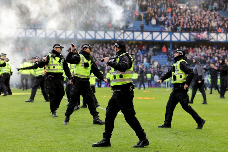 Nine arrested after Rangers and Celtic supporters brawl at Scottish Cup tie