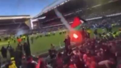 Watch terrifying moment lobbed flare sends Celtic fans scrambling