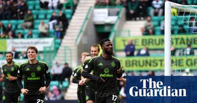 Celtic level with Hearts at the top after Iheanacho winner breaks 10-man Hibs