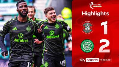 Celtic edge past 10-man Hibs to go joint top