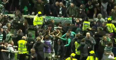 Celtic pitch invasion as 98th-minute Kelechi Iheancho penalty keeps title hope alive