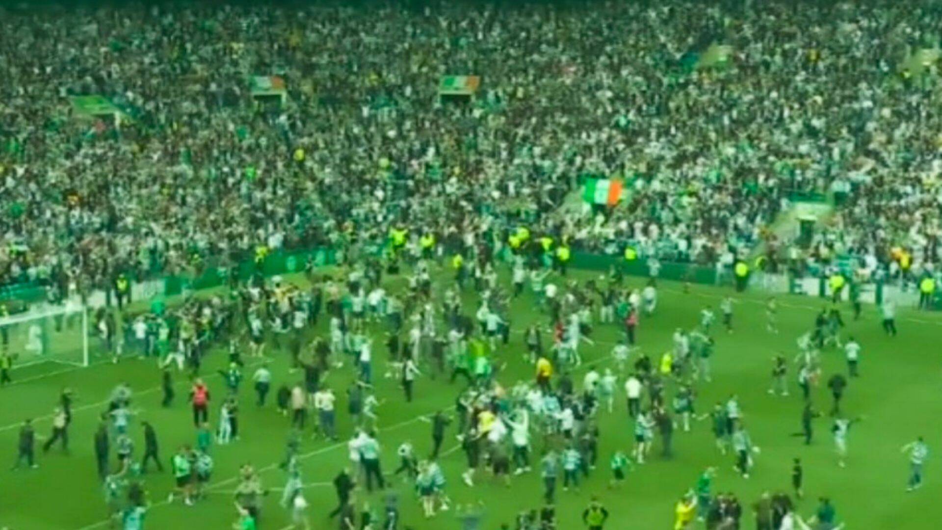 Celtic clinch title amid CHAOTIC scenes after wild pitch invasion before final whistle as Hearts left broken