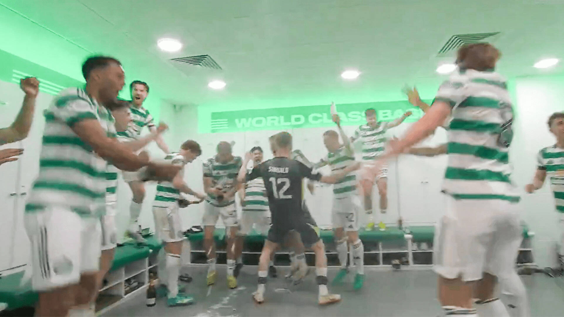 Moment gleeful Celtic stars troll RANGERS after record title win as they hijack Ibrox anthem in dressing room