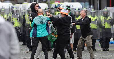 Police responding to medical emergency pelted with bottles by rowdy Celtic fans
