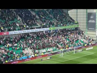Hibernian fans celebrate Callum Osmand sealing the Scottish Premiership title for Celtic