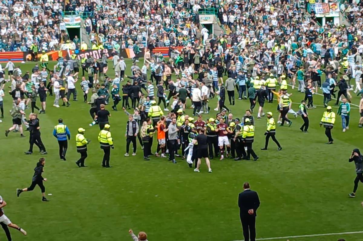Watch video of Celtic Park chaos as Hearts get a Police escort out of Glasgow after pitch invasion and assault