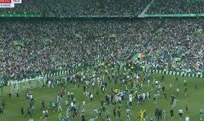Celtic apologise to Hearts after chaotic pitch invasion leads to violence at Premiership decider