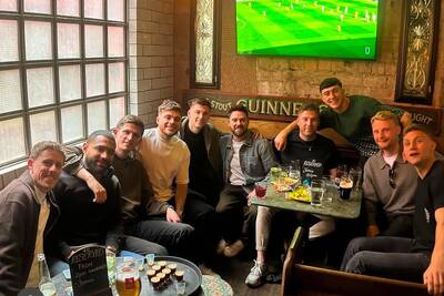 Celtic stars celebrate dramatic title victory over Hearts at Glasgow city centre Irish pub