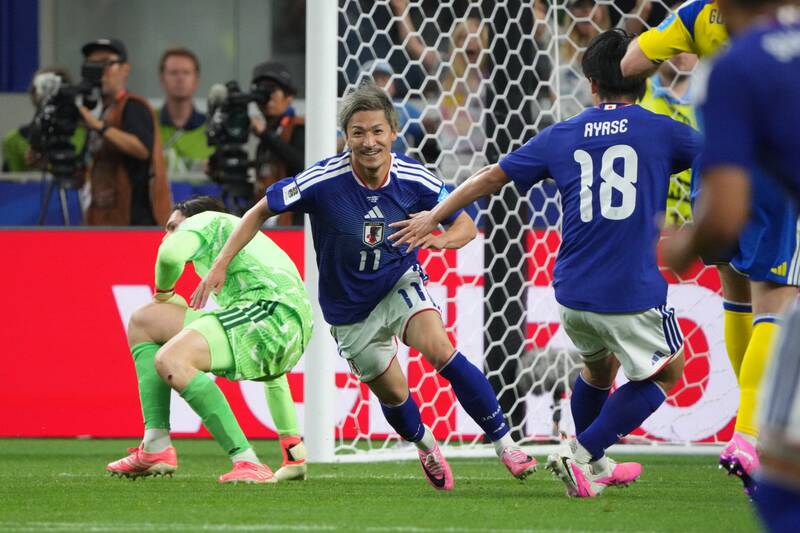 Daizen Maeda scores in Benjamin Nygren face-off as Celtic pair embrace after World Cup clash
