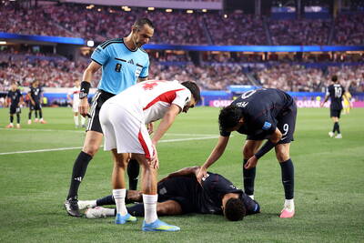 Auston Trusty stretchered off after scoring at the World Cup