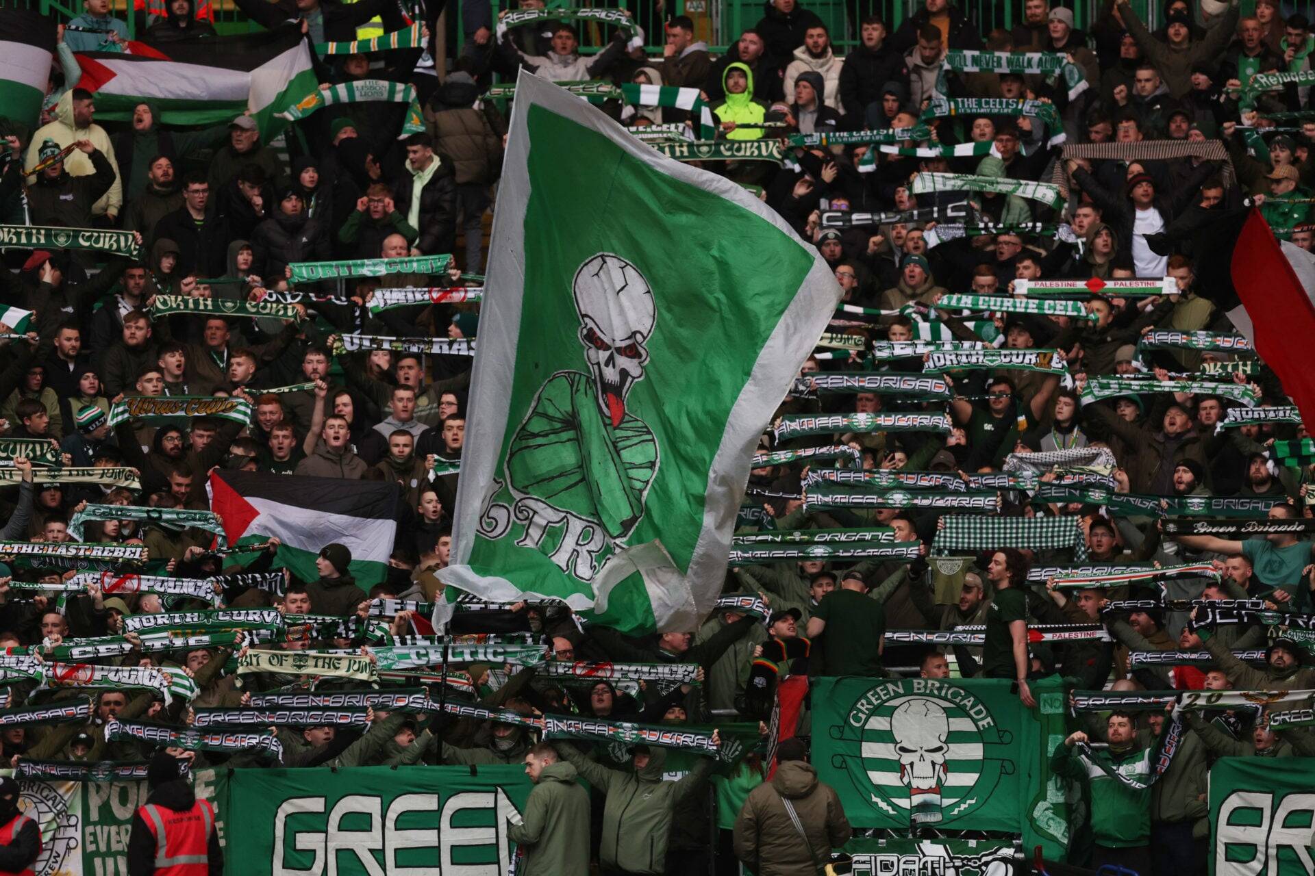 Green Brigade raise anti-racist and anti-board banners at Celtic vs Dundee