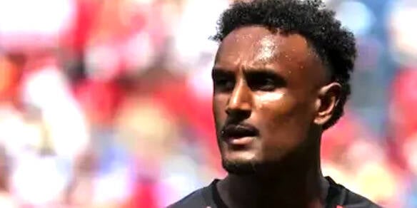 £9m HASSAN ON THE BRINK