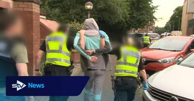 Police raid homes in Celtic title disorder crackdown as four arrested