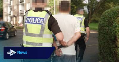 Police raid more homes in Celtic title disorder crackdown as arrests hit 47