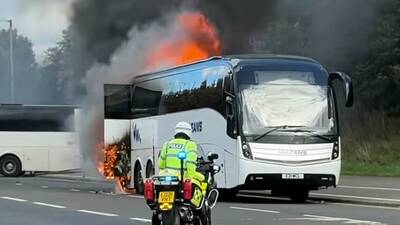Celtic supporters bus bursts into FLAMES: Emergency services rush to scene in Glasgow to evacuate fans after O** F*** derby Celtic supporters bus bursts into FLAMES: Emergency services rush to scene in Glasgow to evacuate fans after O** F*** derby