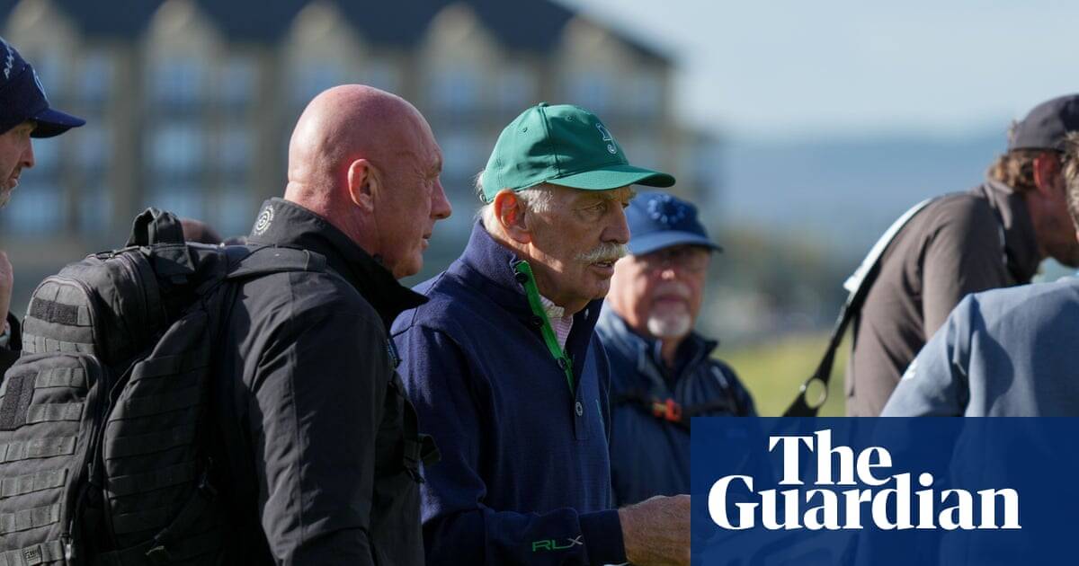 Celtic fans throw tennis balls at club owner Dermot Desmond during golf tournament