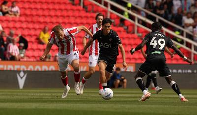 How has Elijah Just performed at table-toppers Swansea after being linked with Celtic