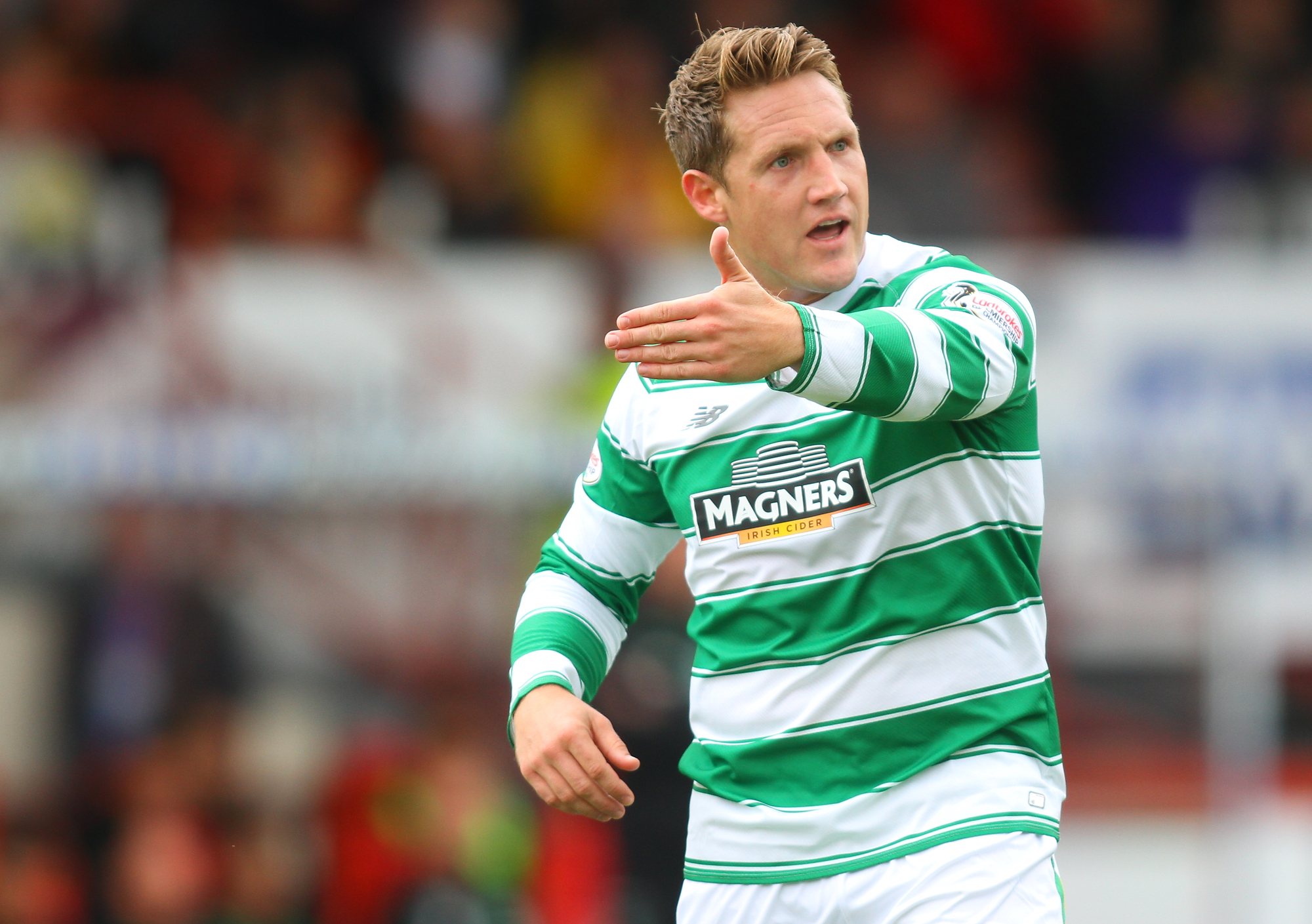 Hibernian complete loan signing of Celtic midfielder Kris Commons