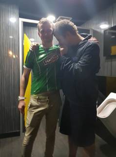 Liam Gallagher kisses Hoops badge at Perth festival Liam Gallagher kisses Hoops badge at Perth festival