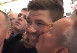 Video: One Liverpool Fan Tells Steven Gerrard to ‘Smash Celtic’ as He’s Bombarded at Airport