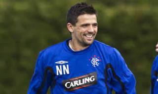 Celtic fan abuses former Rangers hero Nacho Novo at Belfast airport Celtic fan abuses former Rangers hero Nacho Novo at Belfast airport